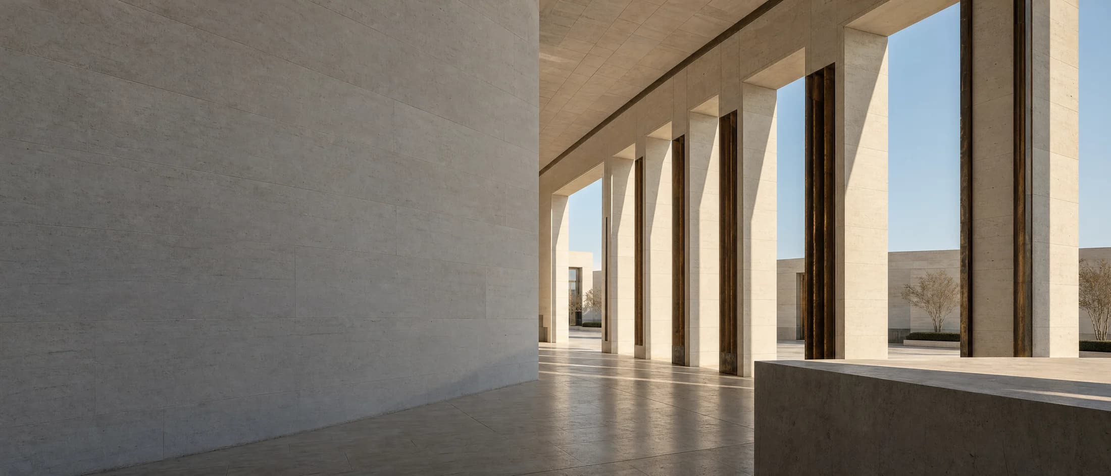 Architectural study of a limestone colonnade opening into daylight